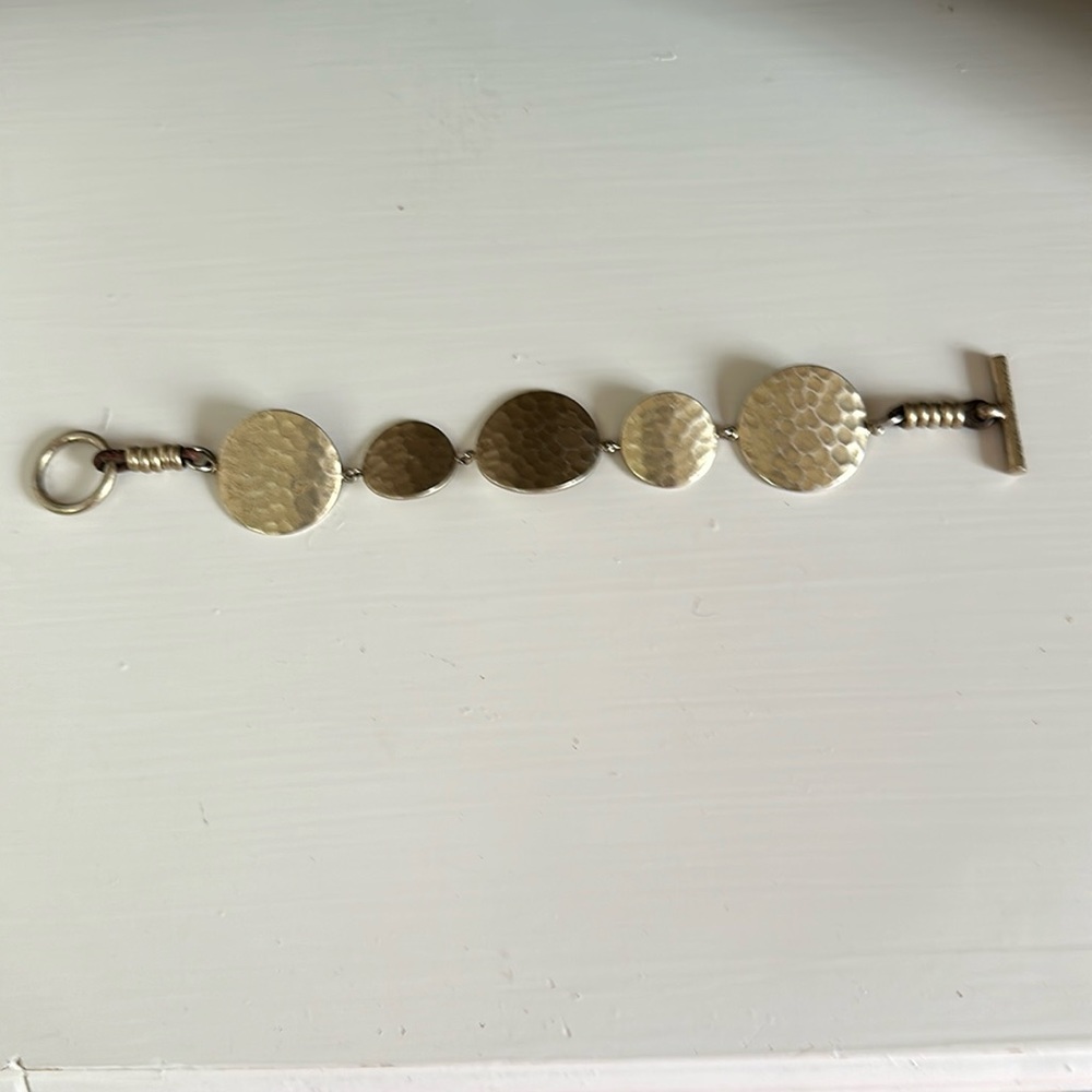 Kenneth Cole hammered gold tone bracelet